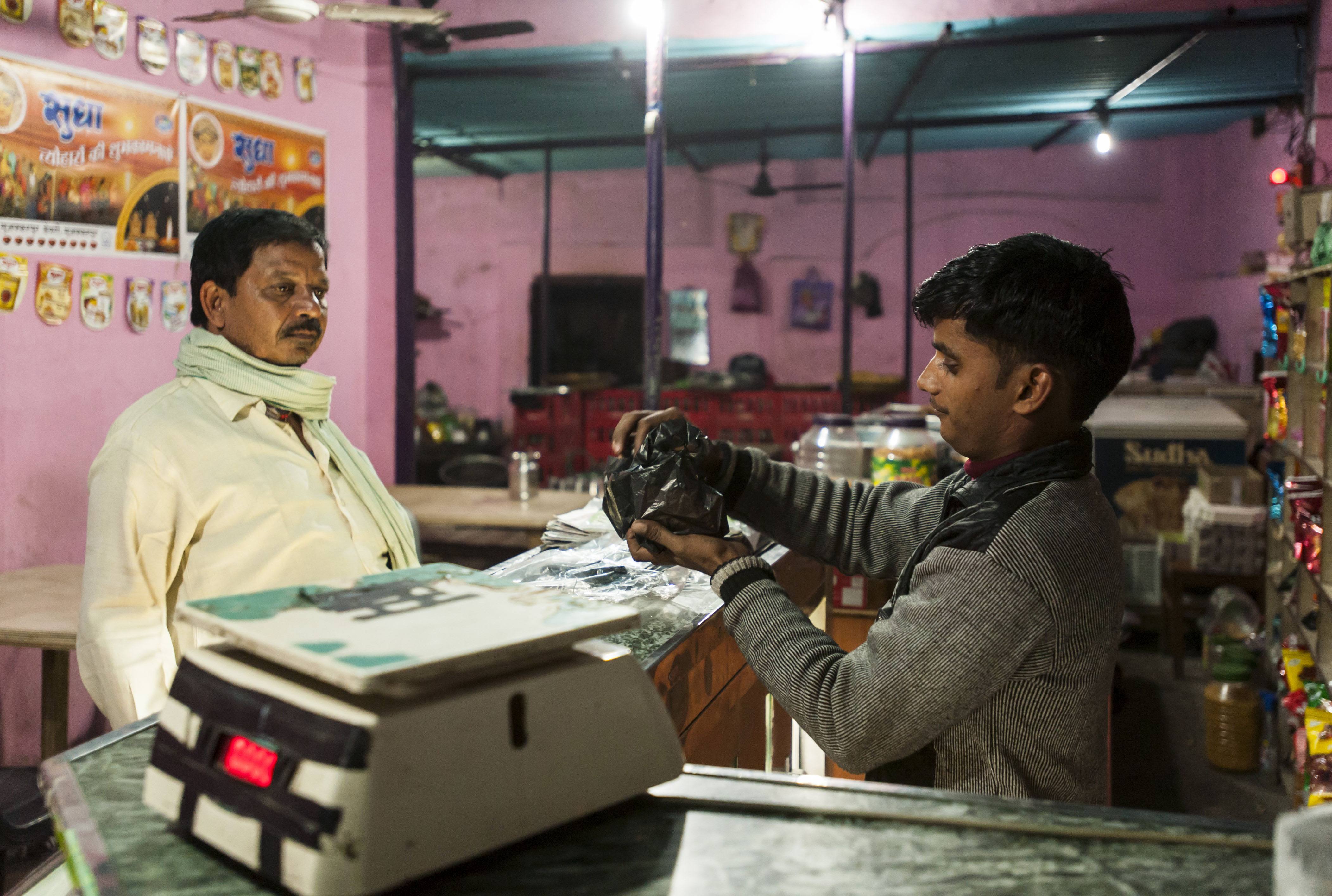 Image of a shop in India two men